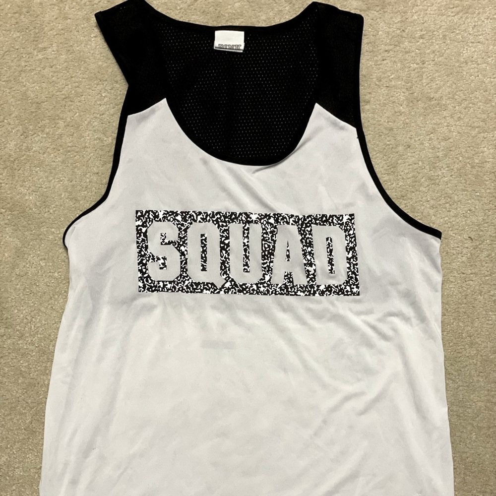 Victoria’s Secret workout shirt. The back is mesh.